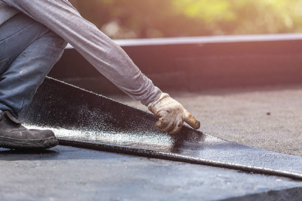 Professional Waterproofing technician working in Adams, WI